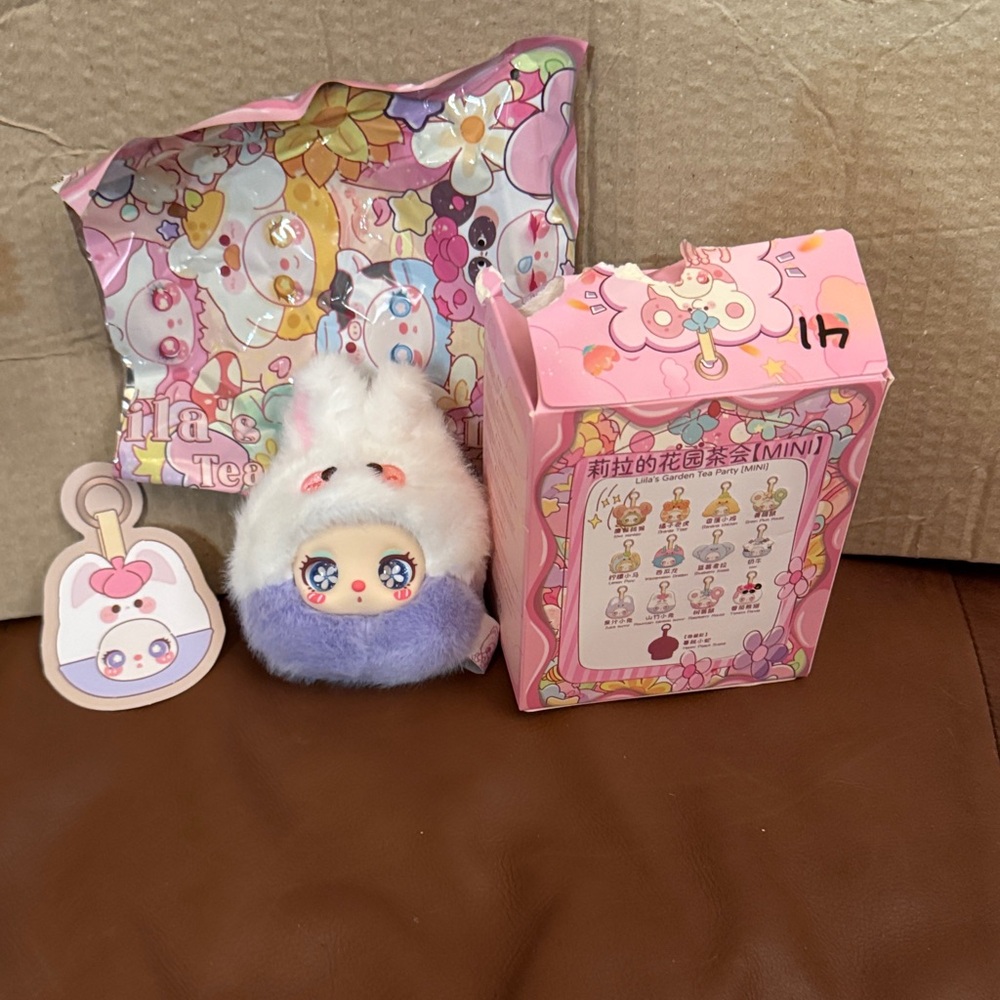 Fluffy Purple and White Stuffed Animal Bag Charm or Keychain.